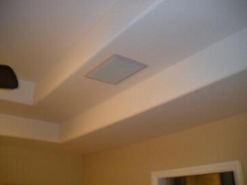 Installed right in-ceiling speaker completed with speaker grill installed